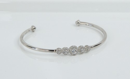 Sterling Silver/CZ Graduated 5 Cluster Torq Bangle